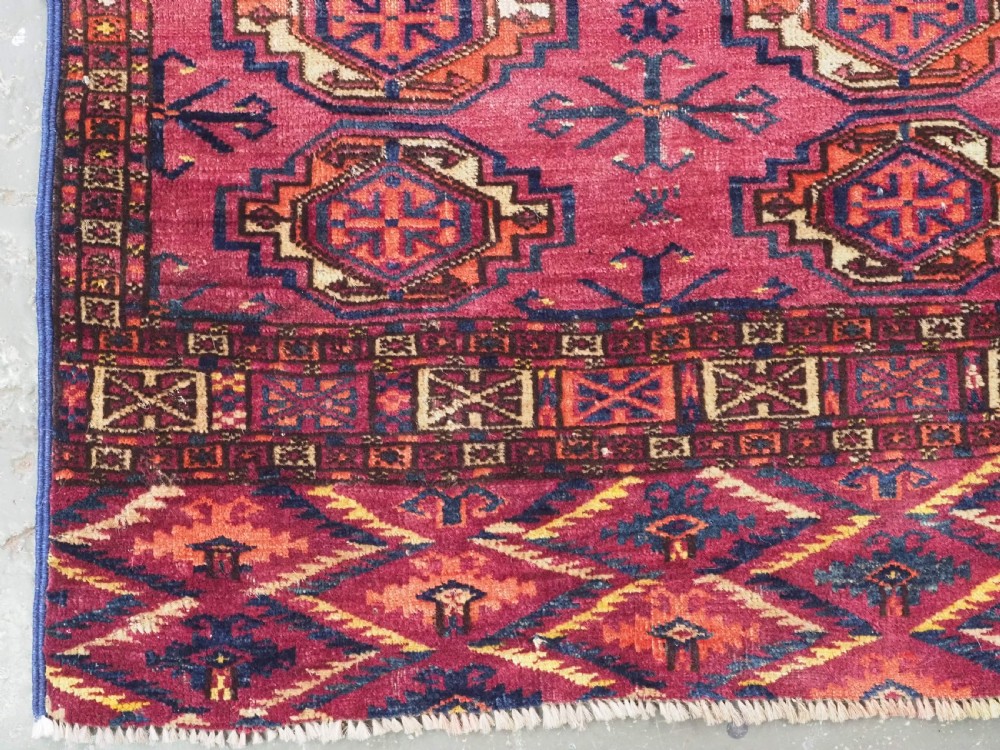 ANTIQUE TEKKE (SARYK) TURKMEN 16 GUL CHUVAL FACE, SCARCE COCHINEAL FIELD COLOUR, CIRCA 1880. View VII