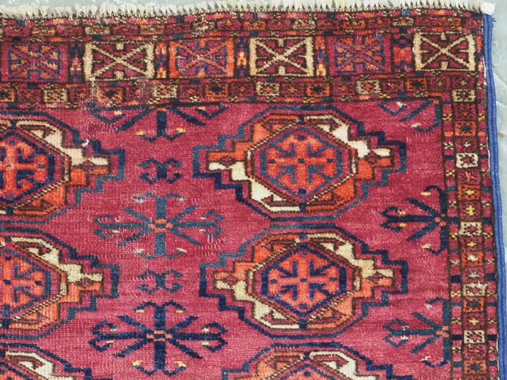 ANTIQUE TEKKE (SARYK) TURKMEN 16 GUL CHUVAL FACE, SCARCE COCHINEAL FIELD COLOUR, CIRCA 1880. View VIII
