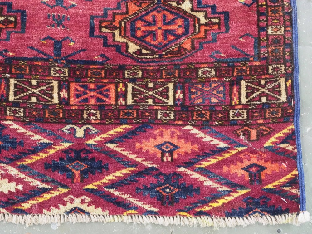 ANTIQUE TEKKE (SARYK) TURKMEN 16 GUL CHUVAL FACE, SCARCE COCHINEAL FIELD COLOUR, CIRCA 1880. View IX