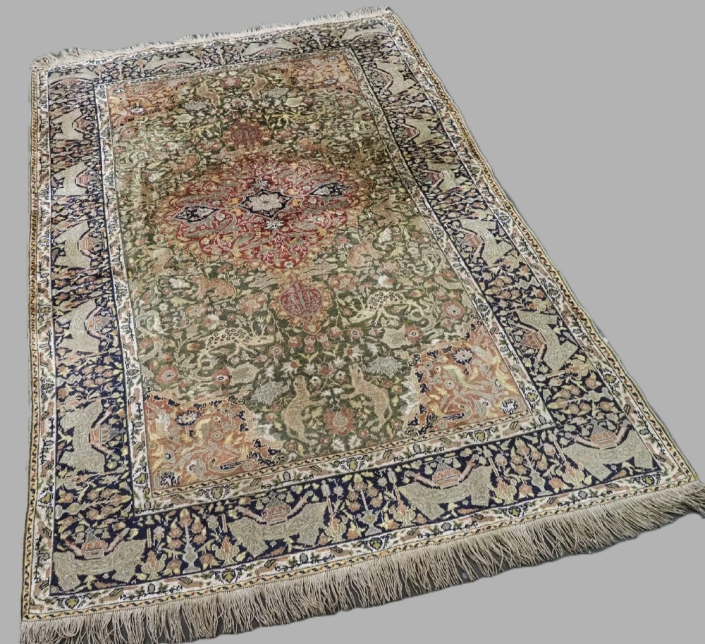 ANTIQUE TURKISH KAYSERI PICTORIAL SILK RUG WITH HUNTING DESIGN, CIRCA 1890. View II