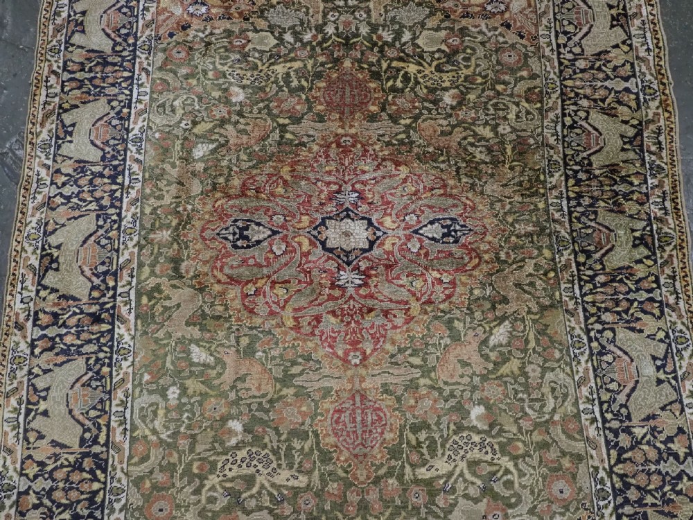 ANTIQUE TURKISH KAYSERI PICTORIAL SILK RUG WITH HUNTING DESIGN, CIRCA 1890. View IV