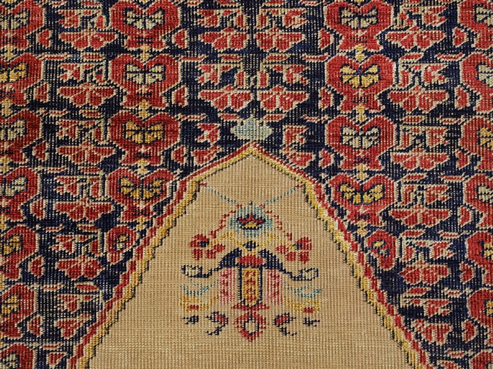 An antique late 19th-century Turkish Kayseri silk prayer rug featuring a central beige mihrab niche surrounded by geometric red and navy borders. View XI