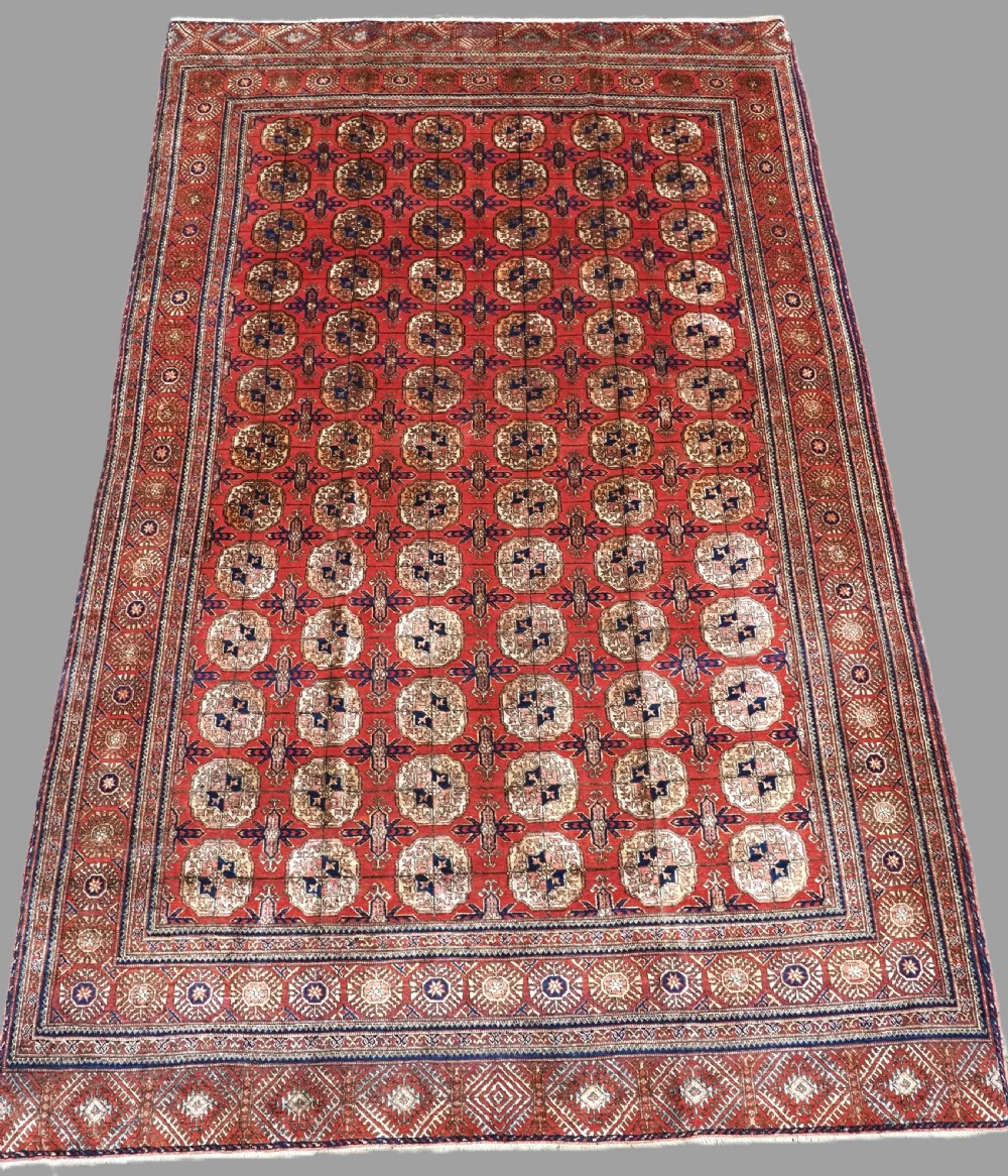 ANTIQUE SILK TEKKE TURKMEN RUG, VERY FINE WEAVE AND GREAT COLOUR, CIRCA 1920.