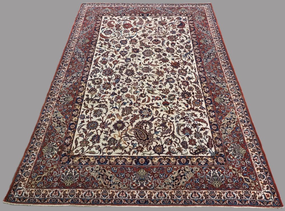 ANTIQUE ISFAHAN CARPET OF FINE WEAVE, ALL OVER DESIGN, CIRCA 1910.