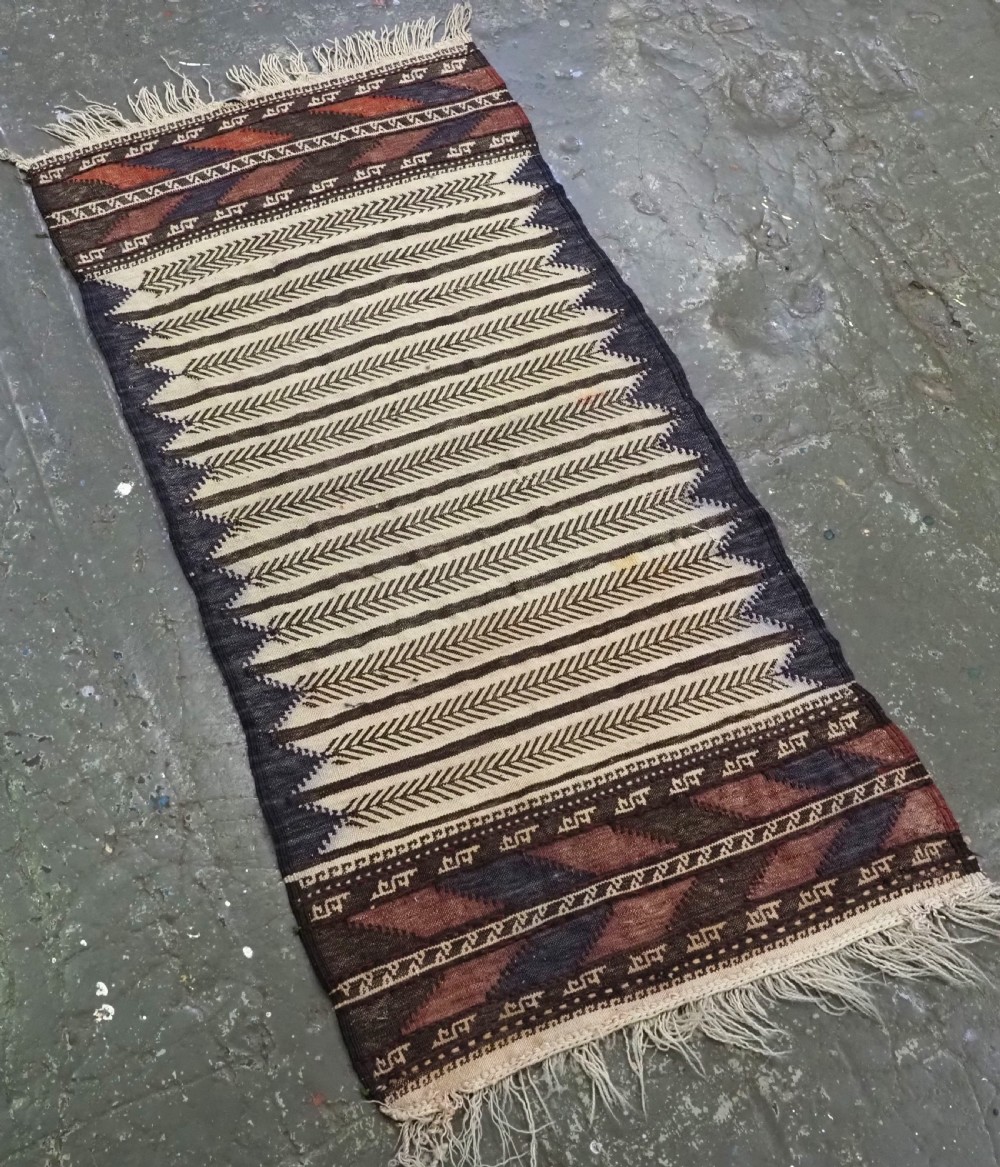 ANTIQUE AFGHAN BALUCH SOFREH EATING CLOTH, DECORATED FLAT WEAVE, CIRCA 1920. View II