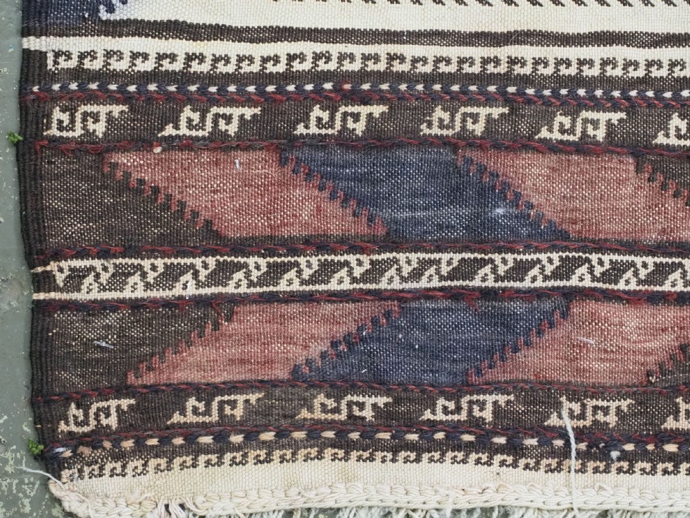 ANTIQUE AFGHAN BALUCH SOFREH EATING CLOTH, DECORATED FLAT WEAVE, CIRCA 1920. View VIII