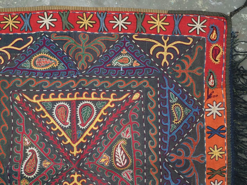 ANTIQUE KYRGYZ EMBROIDERED 'ILGICH' DECORATIVE WALL HANGING, CIRCA 1900. View V