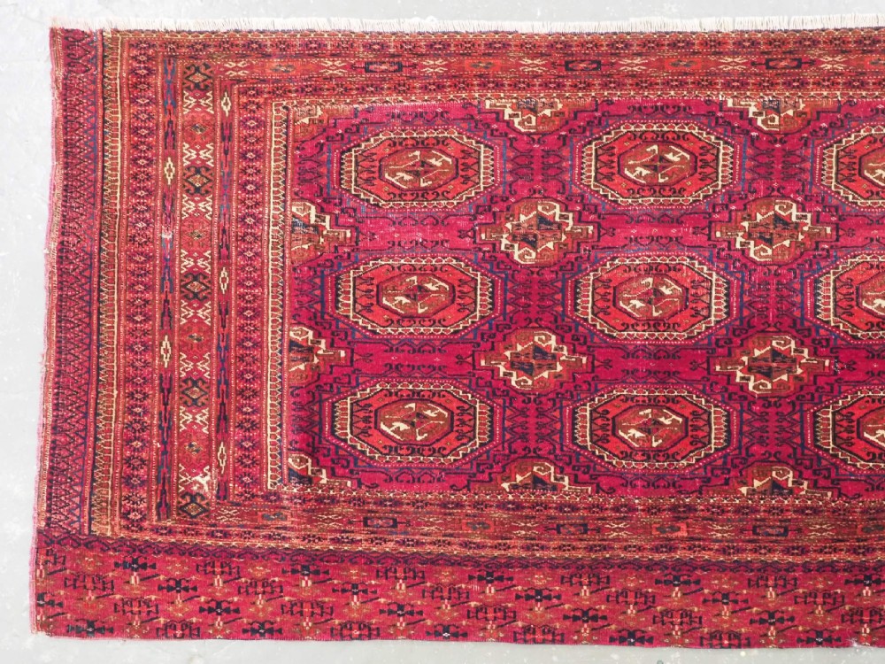 ANTIQUE TEKKE OR SARYK TURKMEN 9 GUL CHUVAL FACE, COCHINEAL DYE, CIRCA 1880. View II