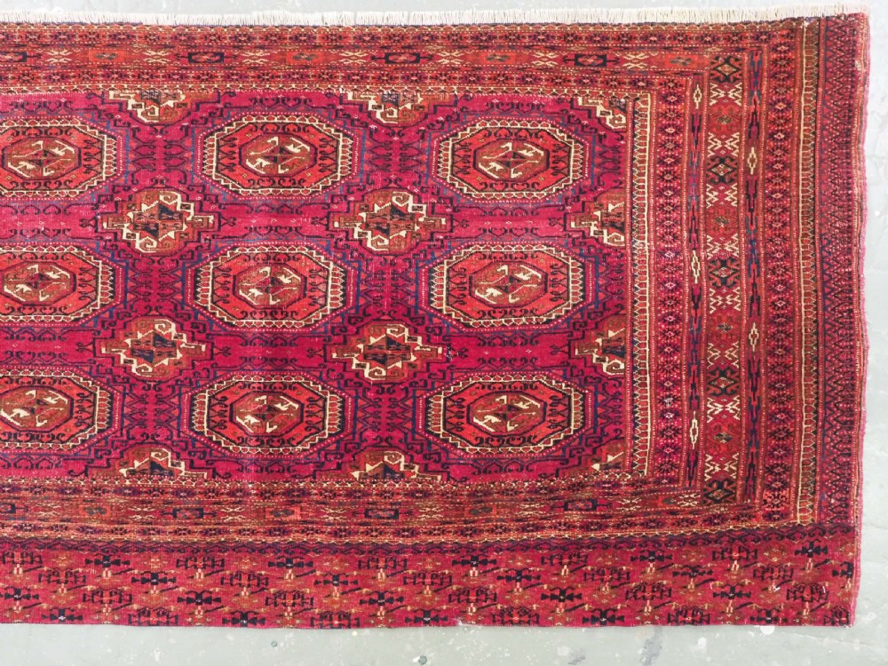 ANTIQUE TEKKE OR SARYK TURKMEN 9 GUL CHUVAL FACE, COCHINEAL DYE, CIRCA 1880. View III
