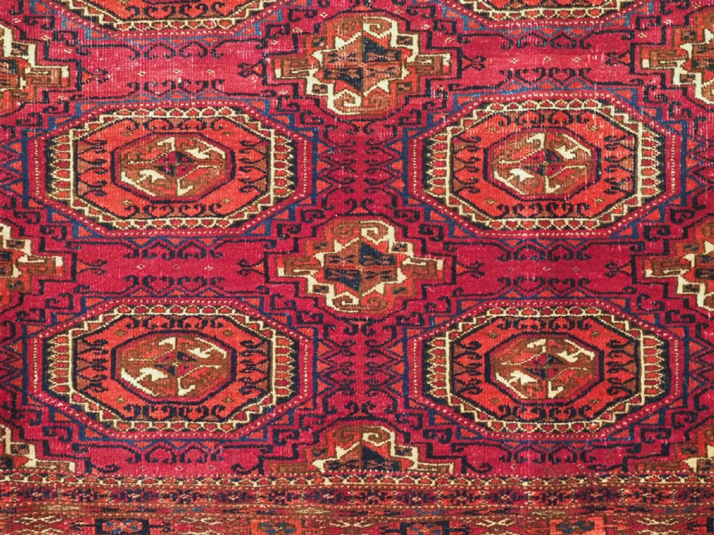 ANTIQUE TEKKE OR SARYK TURKMEN 9 GUL CHUVAL FACE, COCHINEAL DYE, CIRCA 1880. View V