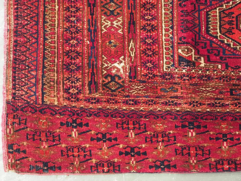 ANTIQUE TEKKE OR SARYK TURKMEN 9 GUL CHUVAL FACE, COCHINEAL DYE, CIRCA 1880. View VI