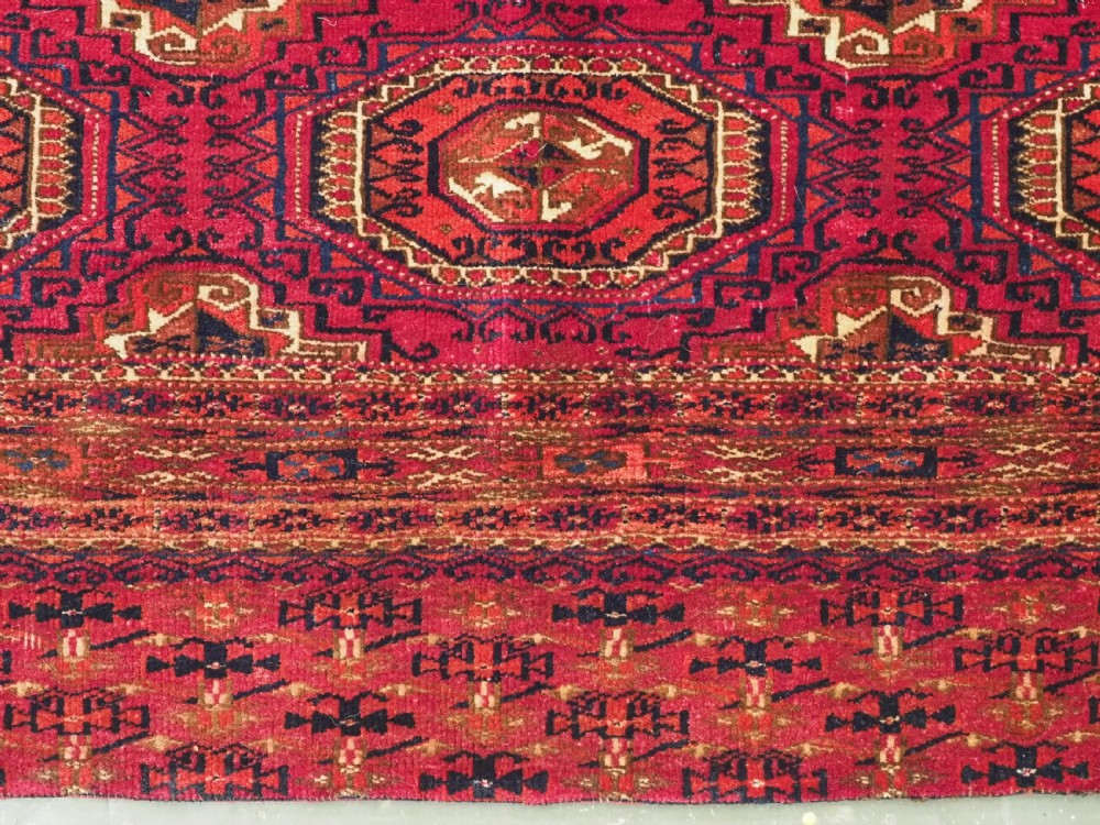 ANTIQUE TEKKE OR SARYK TURKMEN 9 GUL CHUVAL FACE, COCHINEAL DYE, CIRCA 1880. View VIII