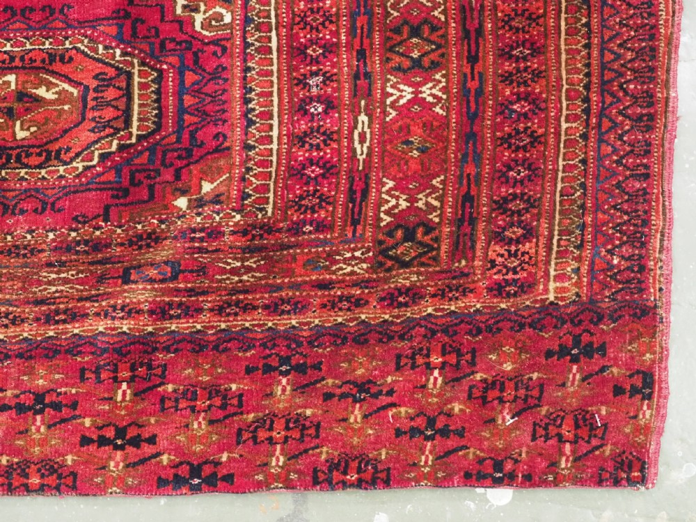 ANTIQUE TEKKE OR SARYK TURKMEN 9 GUL CHUVAL FACE, COCHINEAL DYE, CIRCA 1880. View IX