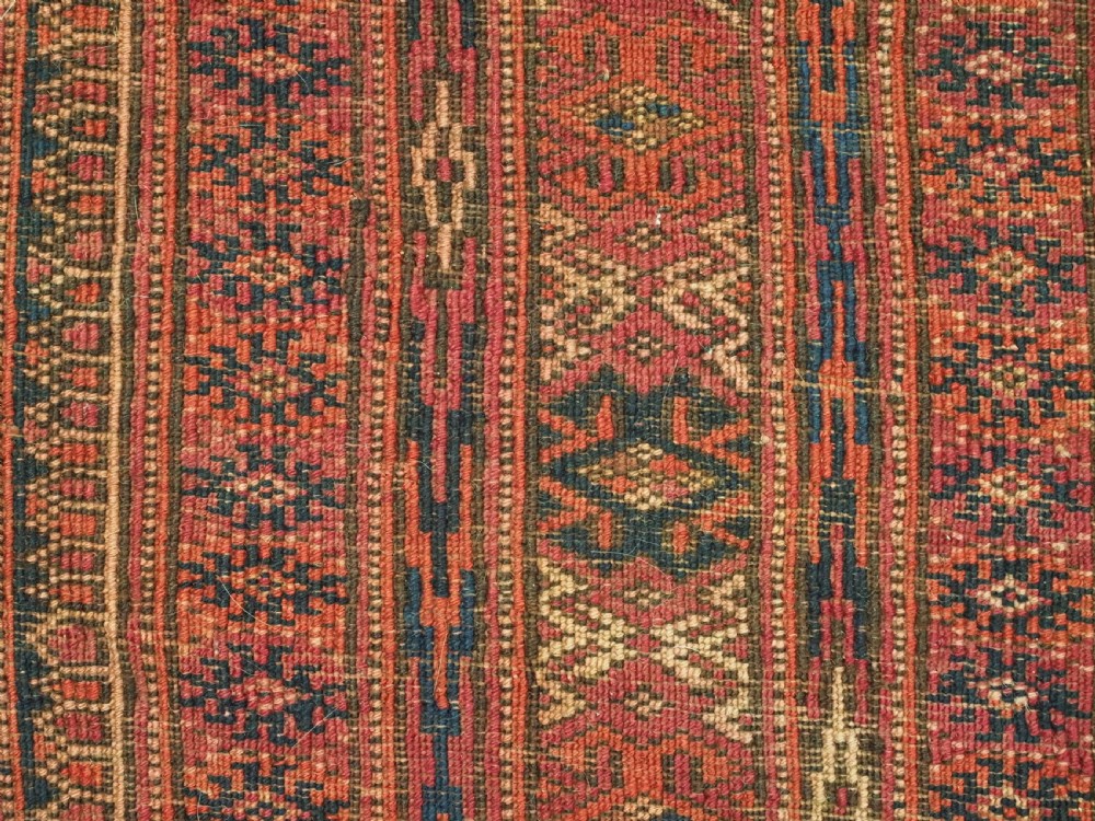 ANTIQUE TEKKE OR SARYK TURKMEN 9 GUL CHUVAL FACE, COCHINEAL DYE, CIRCA 1880. View X