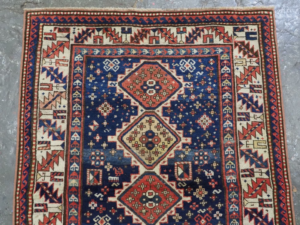 ANTIQUE CAUCASIAN GENDJE REGION SMALL KAZAK RUG, SUPERB COLOR, CIRCA 1890. View III