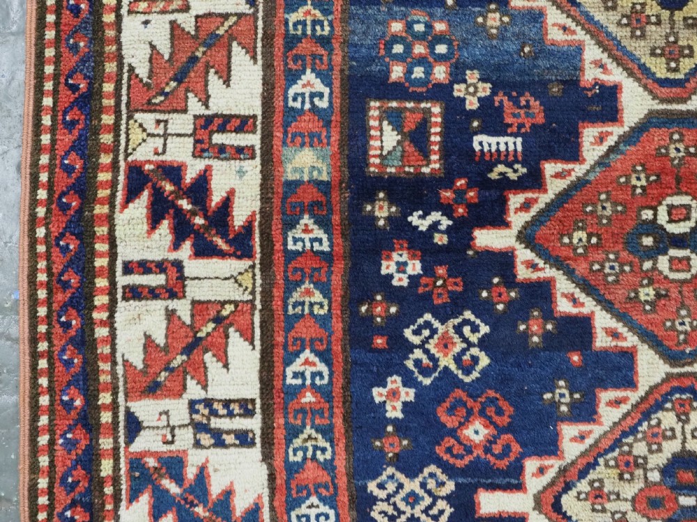 ANTIQUE CAUCASIAN GENDJE REGION SMALL KAZAK RUG, SUPERB COLOR, CIRCA 1890. View VII