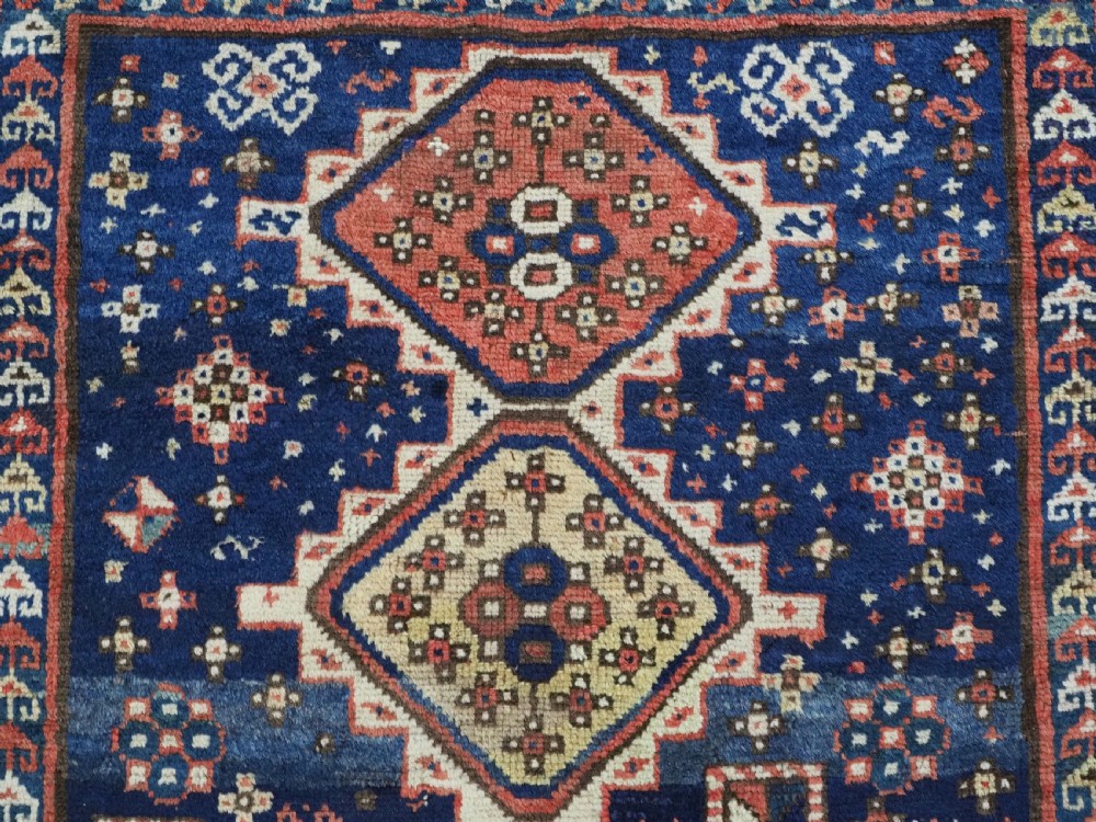 ANTIQUE CAUCASIAN GENDJE REGION SMALL KAZAK RUG, SUPERB COLOR, CIRCA 1890. View VIII