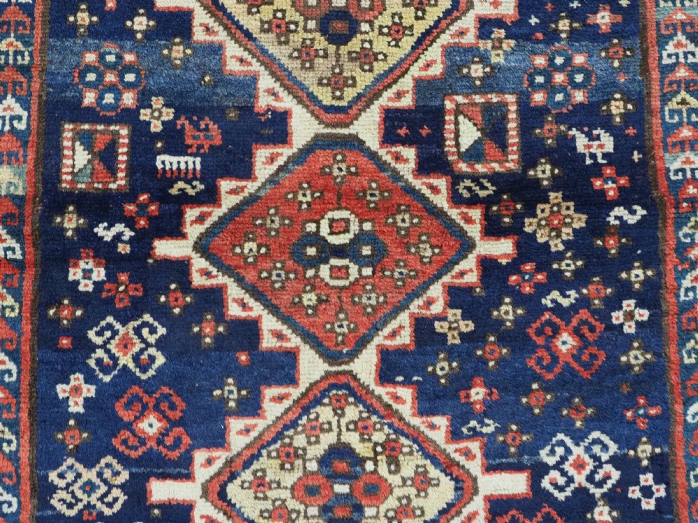 ANTIQUE CAUCASIAN GENDJE REGION SMALL KAZAK RUG, SUPERB COLOR, CIRCA 1890. View IX