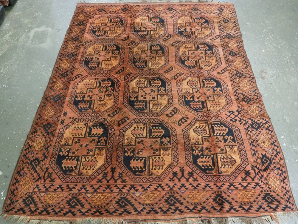 ANTIQUE AFGHAN ERSARI TURKMEN CARPET, WARM COLOURS, CIRCA 1900.