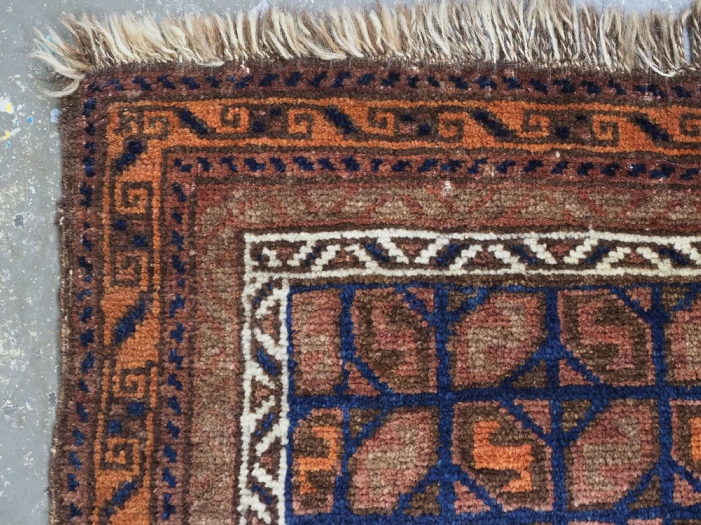ANTIQUE AFGHAN BALUCH PUSHTI FACE WITH 'TILE' DESIGN, CIRCA 1900. View V