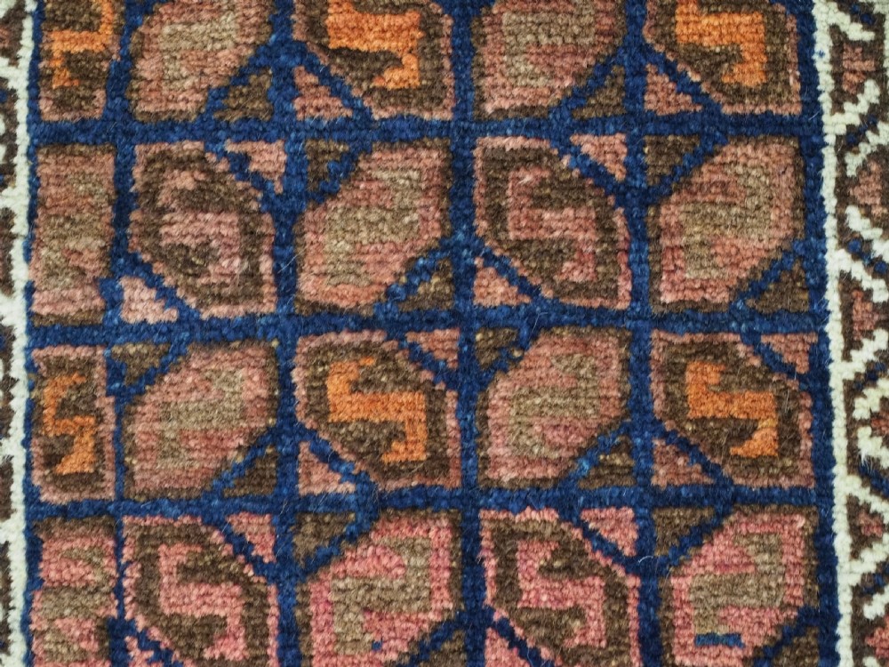 ANTIQUE AFGHAN BALUCH PUSHTI FACE WITH 'TILE' DESIGN, CIRCA 1900. View VI