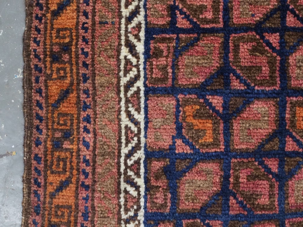 ANTIQUE AFGHAN BALUCH PUSHTI FACE WITH 'TILE' DESIGN, CIRCA 1900. View VII