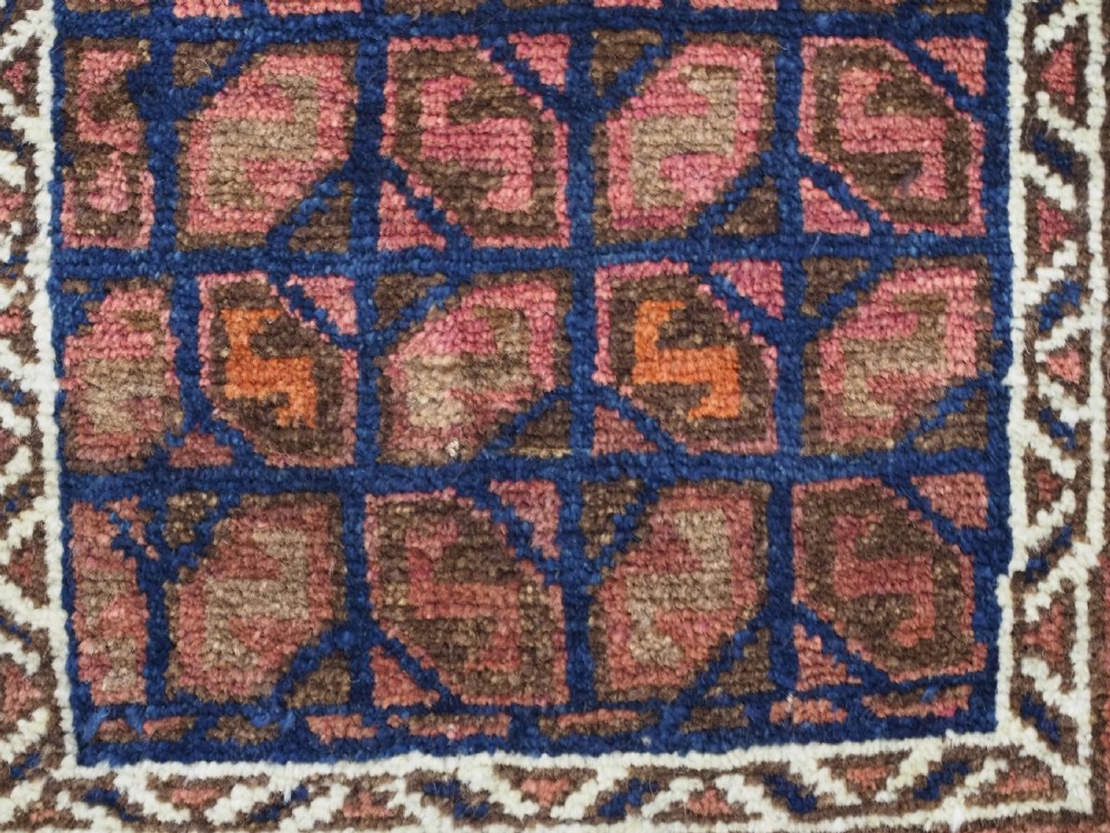 ANTIQUE AFGHAN BALUCH PUSHTI FACE WITH 'TILE' DESIGN, CIRCA 1900. View VIII