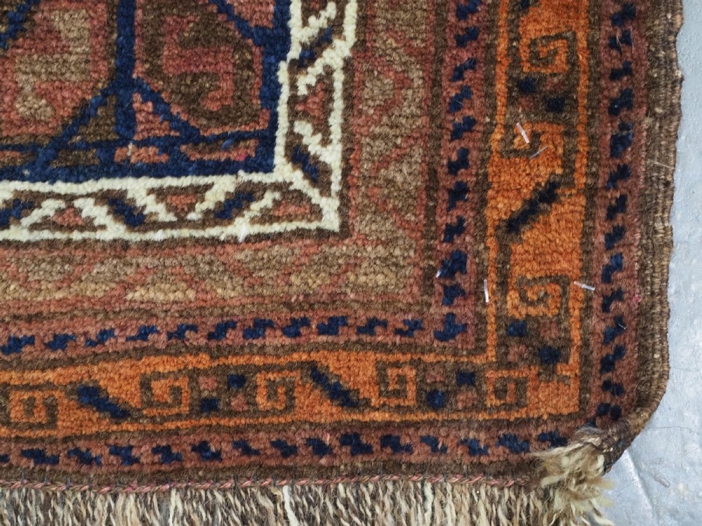 ANTIQUE AFGHAN BALUCH PUSHTI FACE WITH 'TILE' DESIGN, CIRCA 1900. View IX