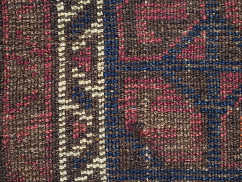 ANTIQUE AFGHAN BALUCH PUSHTI FACE WITH 'TILE' DESIGN, CIRCA 1900. View X