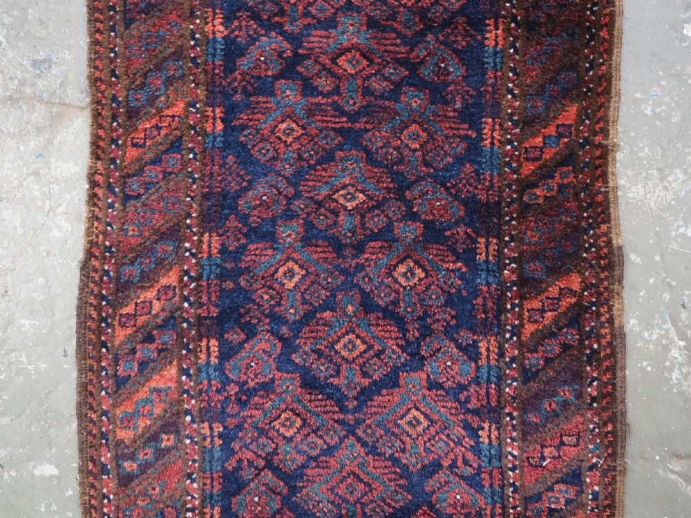 ANTIQUE SISTAN BALUCH PUSHTI FACE WITH TRADITIONAL DESIGN, CIRCA 1900. View III