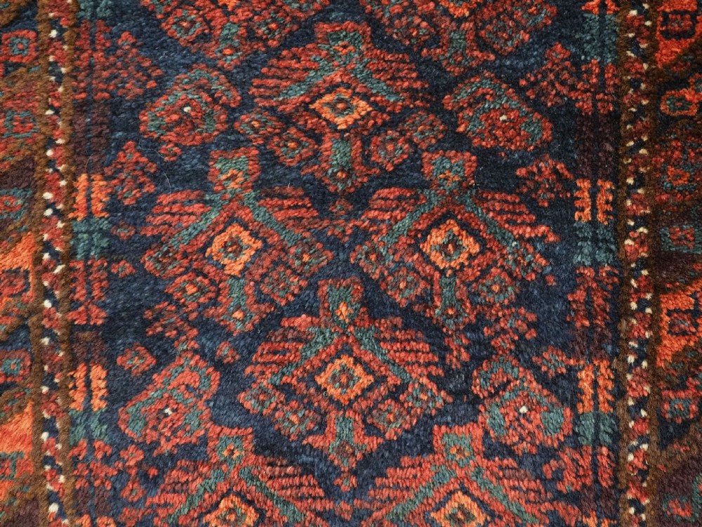 ANTIQUE SISTAN BALUCH PUSHTI FACE WITH TRADITIONAL DESIGN, CIRCA 1900. View VII