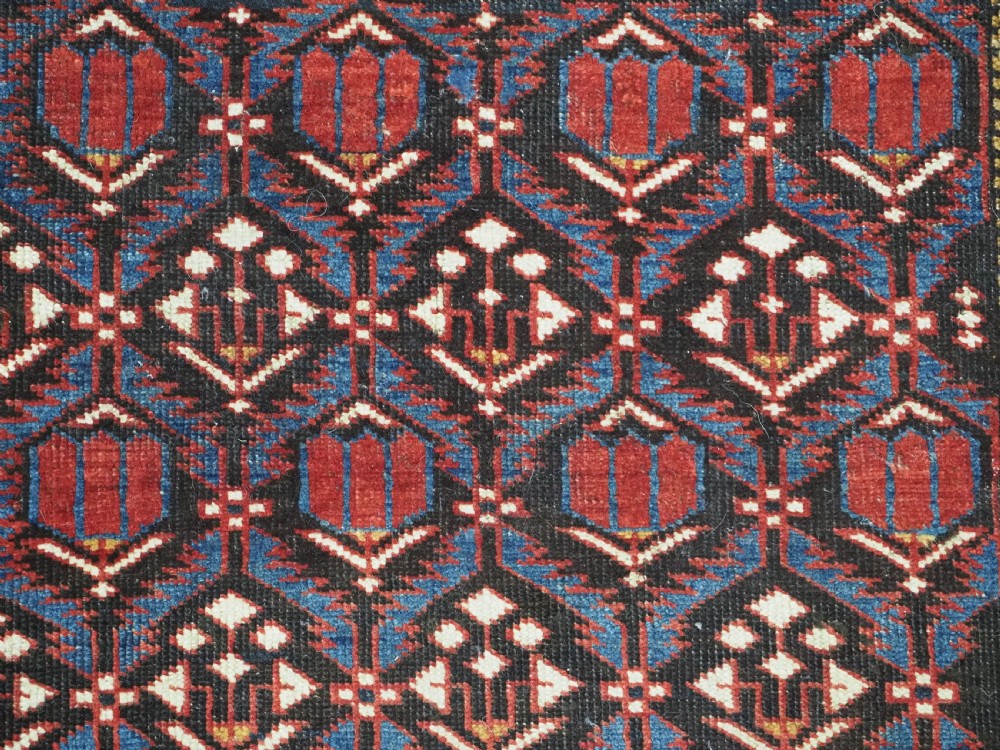 ANTIQUE CAUCASIAN SHIRVAN BAKU REGION RUG WITH 'TULIPS IN LATTICE' DESIGN, CIRCA 1890.  View VIII