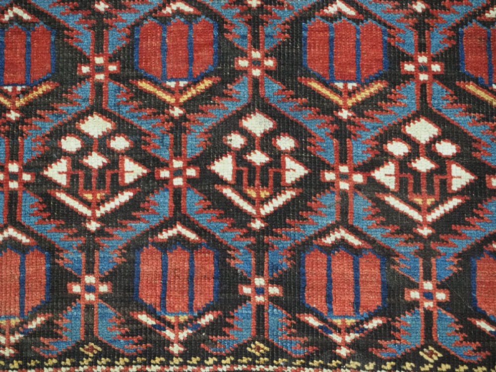 ANTIQUE CAUCASIAN SHIRVAN BAKU REGION RUG WITH 'TULIPS IN LATTICE' DESIGN, CIRCA 1890.  View X