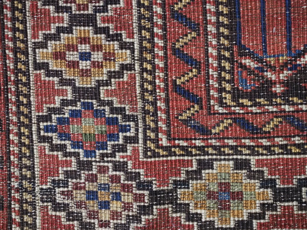 ANTIQUE CAUCASIAN SHIRVAN BAKU REGION RUG WITH 'TULIPS IN LATTICE' DESIGN, CIRCA 1890.  View XII