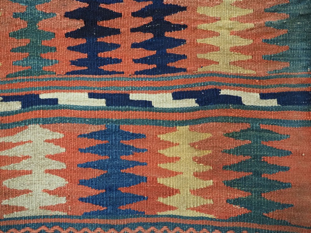An antique 19th-century Jaf Kurd woven bag featuring a knotted pile upper panel with geometric diamond lattice motifs and a colourful flatweave back section. View XI