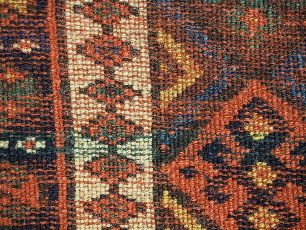 An antique 19th-century Jaf Kurd woven bag featuring a knotted pile upper panel with geometric diamond lattice motifs and a colourful flatweave back section. View XIV