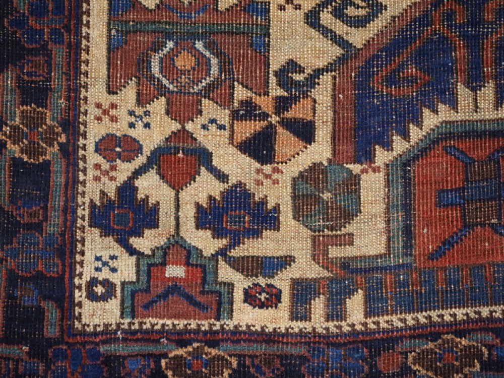 ANTIQUE AFSHAR NERIZ RUG WITH SHIELD DESIGN OF EARLY DATE, 2ND HALF 19TH CENTURY. View X