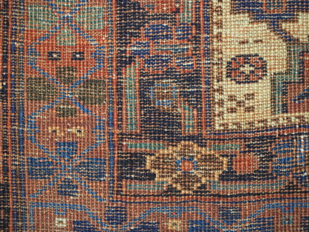 ANTIQUE AFSHAR NERIZ RUG WITH SHIELD DESIGN OF EARLY DATE, 2ND HALF 19TH CENTURY. View XIII