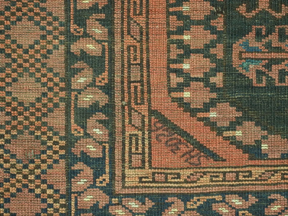 A hand-knotted antique Afghan Ersari Turkmen wool carpet featuring octagonal gul motifs on a rust red ground with geometric borders. View XIII