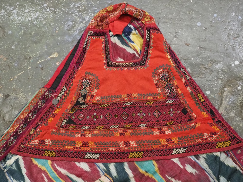 A RARE UZBEK KARAKALPAK LADIES EMBROIDERED WEDDING VEIL WITH SILK IKAT BACK, 19TH CENTURY. View III