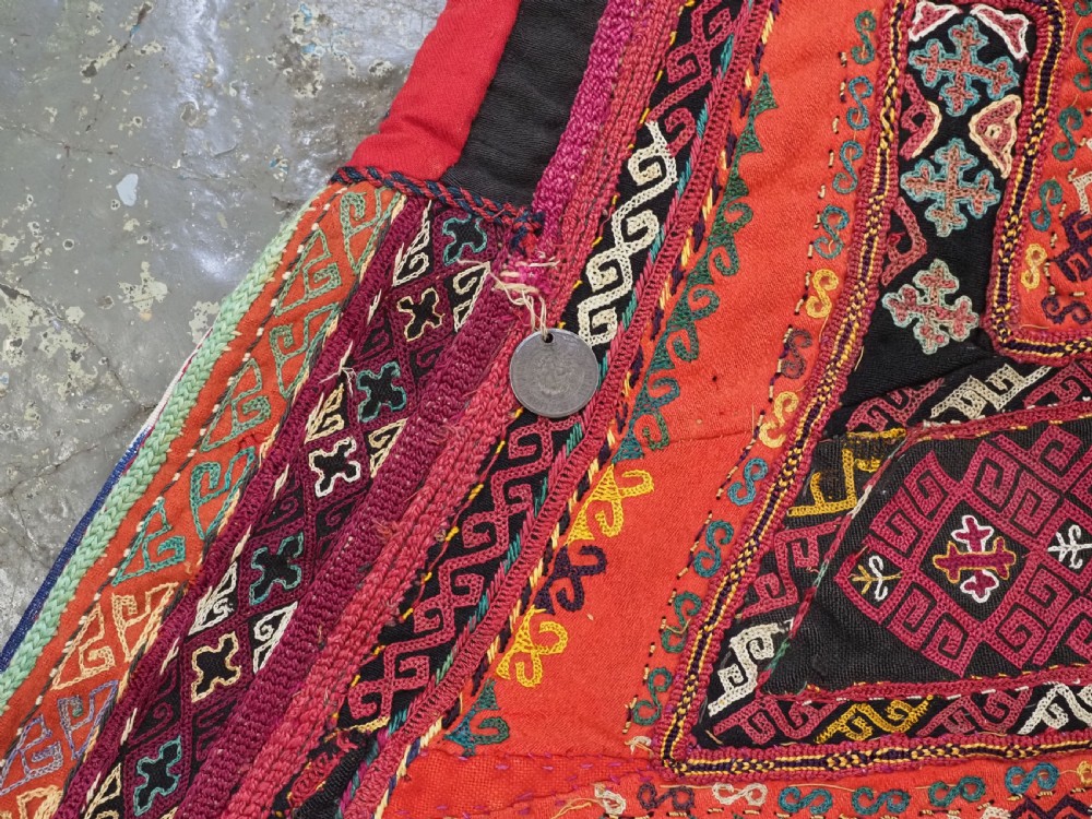 A RARE UZBEK KARAKALPAK LADIES EMBROIDERED WEDDING VEIL WITH SILK IKAT BACK, 19TH CENTURY. View XI