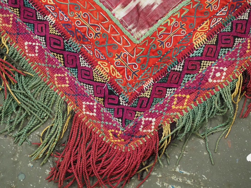 A RARE UZBEK KARAKALPAK LADIES EMBROIDERED WEDDING VEIL WITH SILK IKAT BACK, 19TH CENTURY. View XV