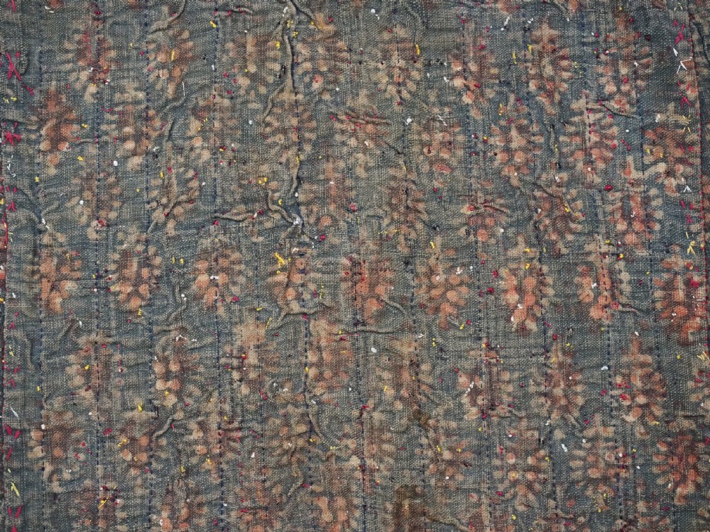 An antique 19th-century Turkmen chyrpy ceremonial coat featuring dense red, yellow, and white silk hand embroidery on a dark base with fringed borders. View XVI