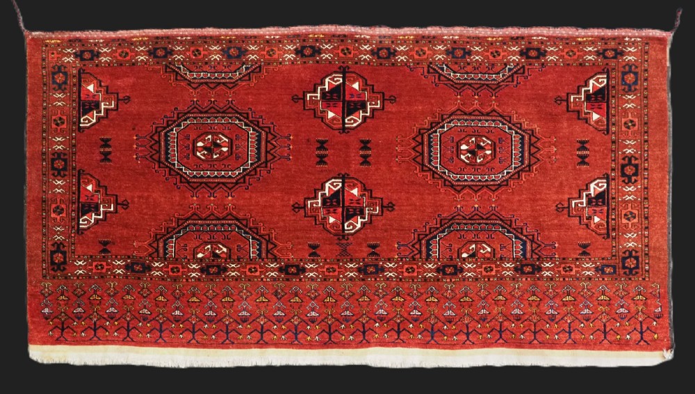 ANTIQUE ERSARI TURKMEN CHUVAL FACE OF UNUSUAL DESIGN & LARGE SIZE, LATE 19TH CENTURY.
