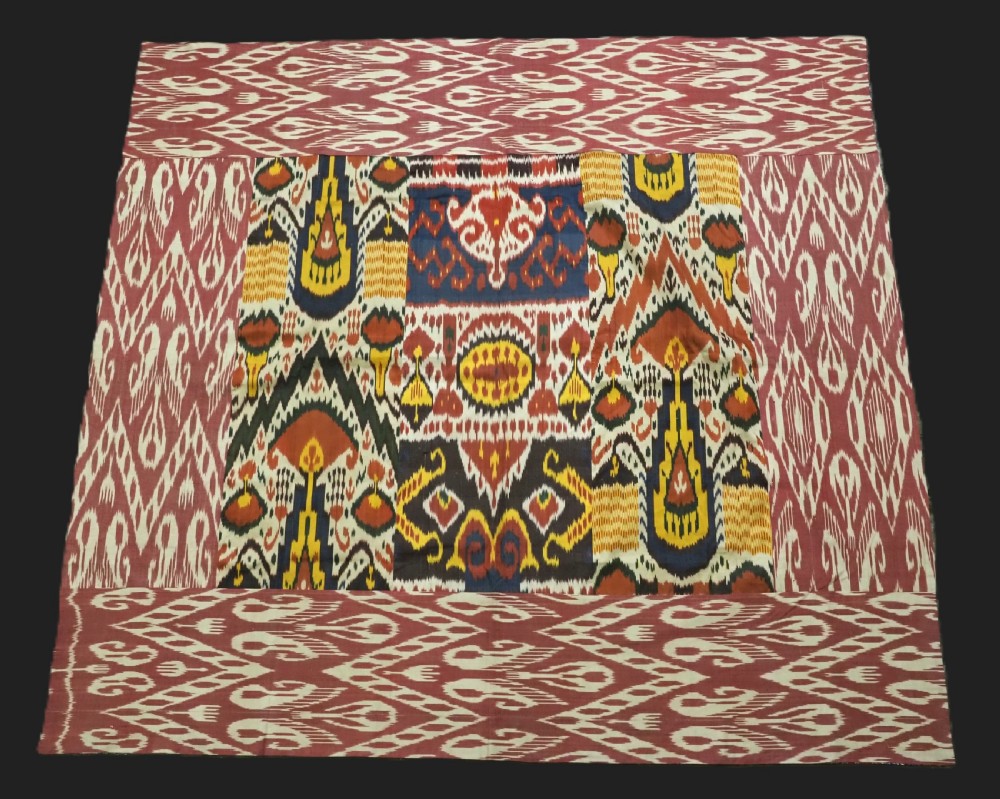 ANTIQUE UZBEK SILK IKAT PANEL, IDEAL WALL HANGING OR COVER. CIRCA 1900.