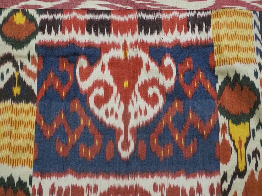 ANTIQUE UZBEK SILK IKAT PANEL, IDEAL WALL HANGING OR COVER. CIRCA 1900. View V