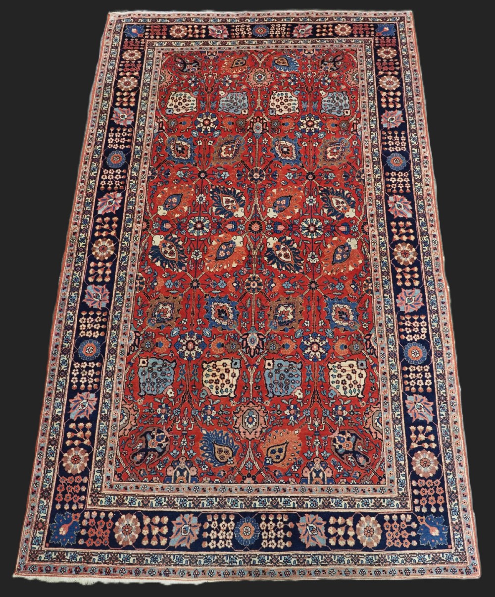 ANTIQUE TABRIZ RUG WITH SAFAVID VASE CARPET DESIGN, SUPERB COLOURS, CIRCA 1900.