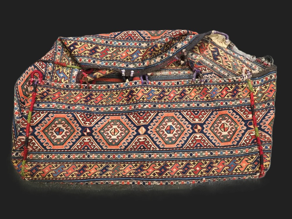ANTIQUE SOUTH CAUCASIAN OR SHAHSAVAN COMPLETE MAFRASH STORAGE BAG IN SOUMAK WORK, CIRCA 1900.