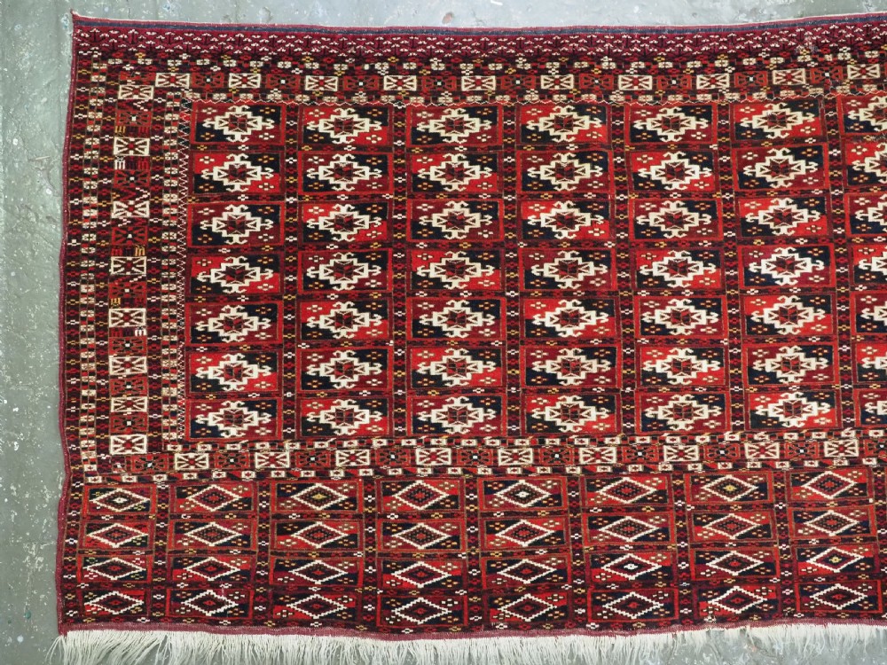 ANTIQUE TEKKE TURKMEN CHUVAL FACE OF SCARCE FORMAT WITH AINA GUL DESIGN, CIRCA 1880. View III