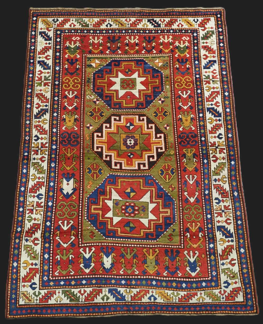 ANTIQUE CAUCASIAN KAZAK RUG WITH 'MEMLINC' GUL DESIGN, CIRCA 1880.